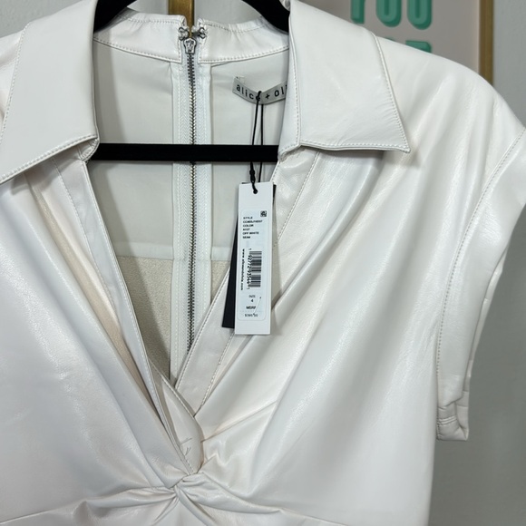 Alice and Olivia
Mila Faux Leather Twist Front Cap Sleeve Dress - Picture 7 of 10